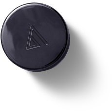 A round, black object with a matte finish, featuring an embossed triangular logo in the center. The object is positioned against a plain white background with its shadow extending to the right side.