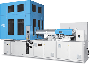 A large blue and white industrial machine with a complex control panel and multiple compartments, used for manufacturing or production processes. The machine features numerous buttons, dials, and gauges, suggesting advanced functionality and automation.